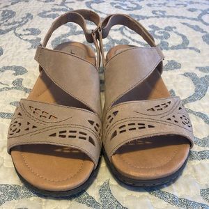 Earth taupe sandals size 9. So comfy! Great condition 1 flaw on sole